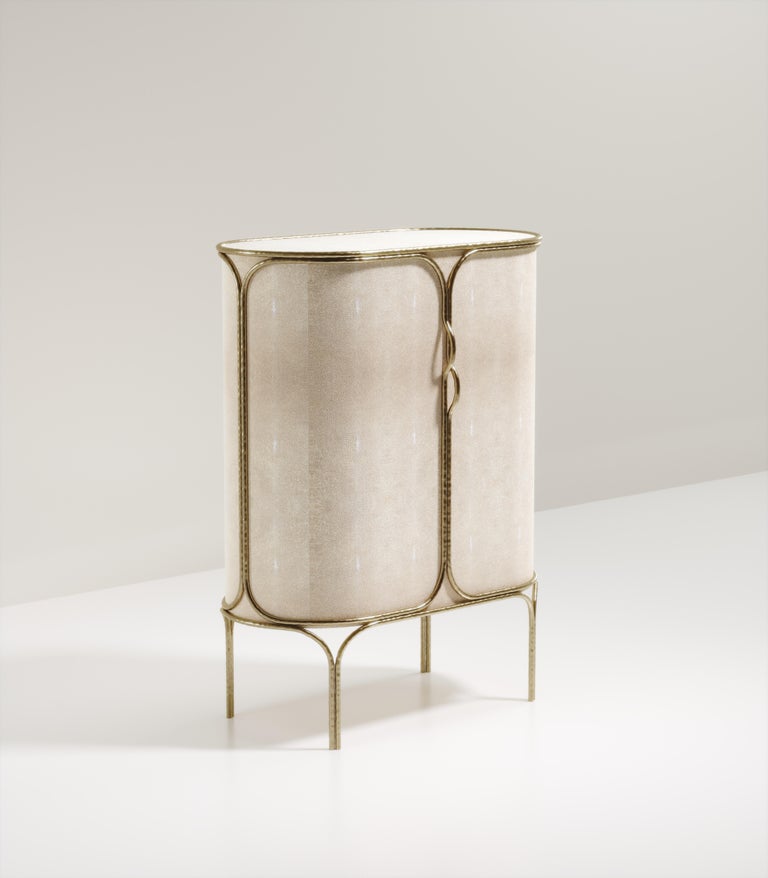 https://a.1stdibscdn.com/shagreen-bar-cabinet-with-chrome-finish-stainless-steel-details-by-ry-augousti-for-sale-picture-12/f_45491/f_359495521693443860236/ARIANE_Bar_white_2_master.jpg?width=768