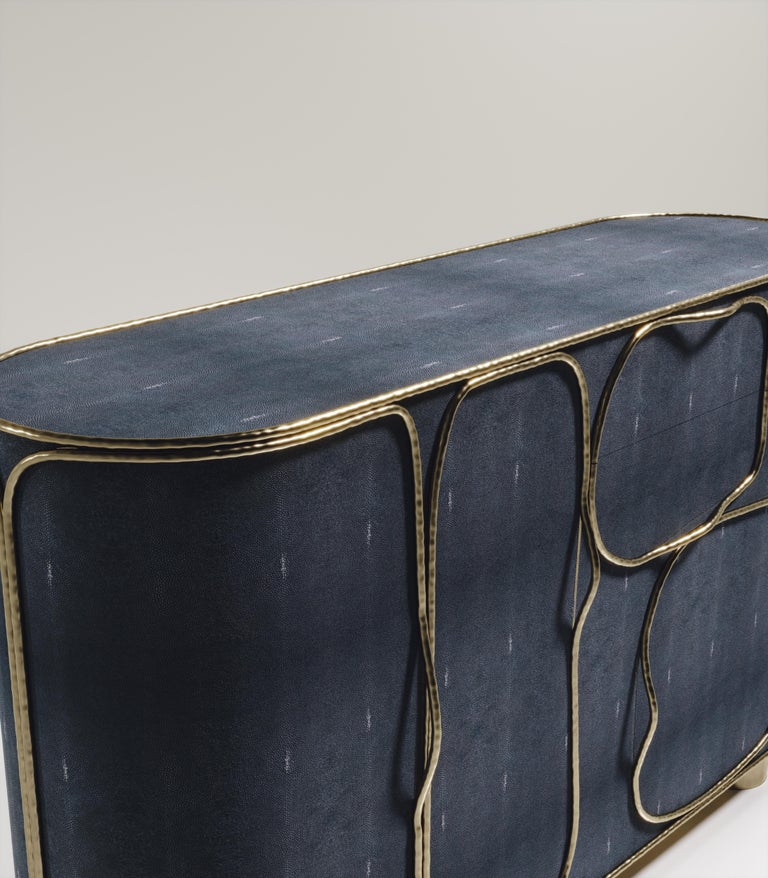 https://a.1stdibscdn.com/shagreen-bar-cabinet-with-chrome-finish-stainless-steel-details-by-ry-augousti-for-sale-picture-18/f_45491/f_359495521693443866016/ARIANE_Buffet_D1_blue_8_master.jpg?width=768