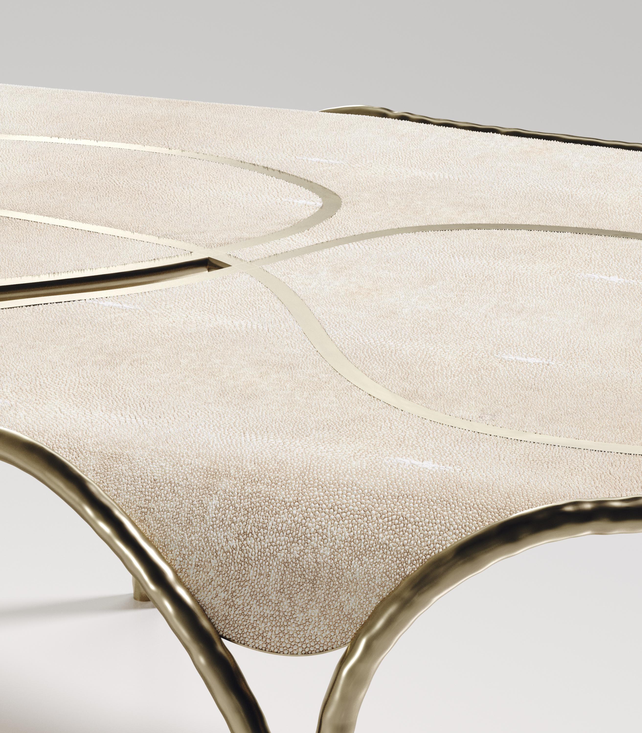 https://a.1stdibscdn.com/shagreen-coffee-table-with-bronze-patina-brass-details-by-ry-augousti-for-sale-picture-4/f_45491/f_267866521641419400373/ARIANE_LOW_TABLE0005_master.jpg