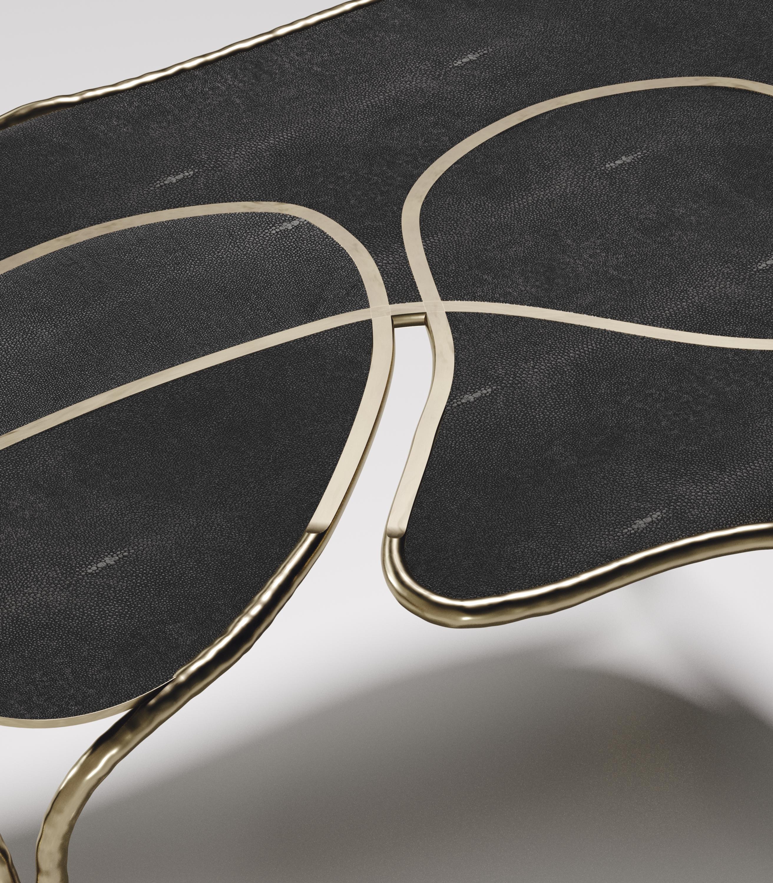 https://a.1stdibscdn.com/shagreen-coffee-table-with-bronze-patina-brass-details-by-ry-augousti-for-sale-picture-4/f_45491/f_267965321641496550405/ARIANE_LOW_TABLE00_156_master.jpg