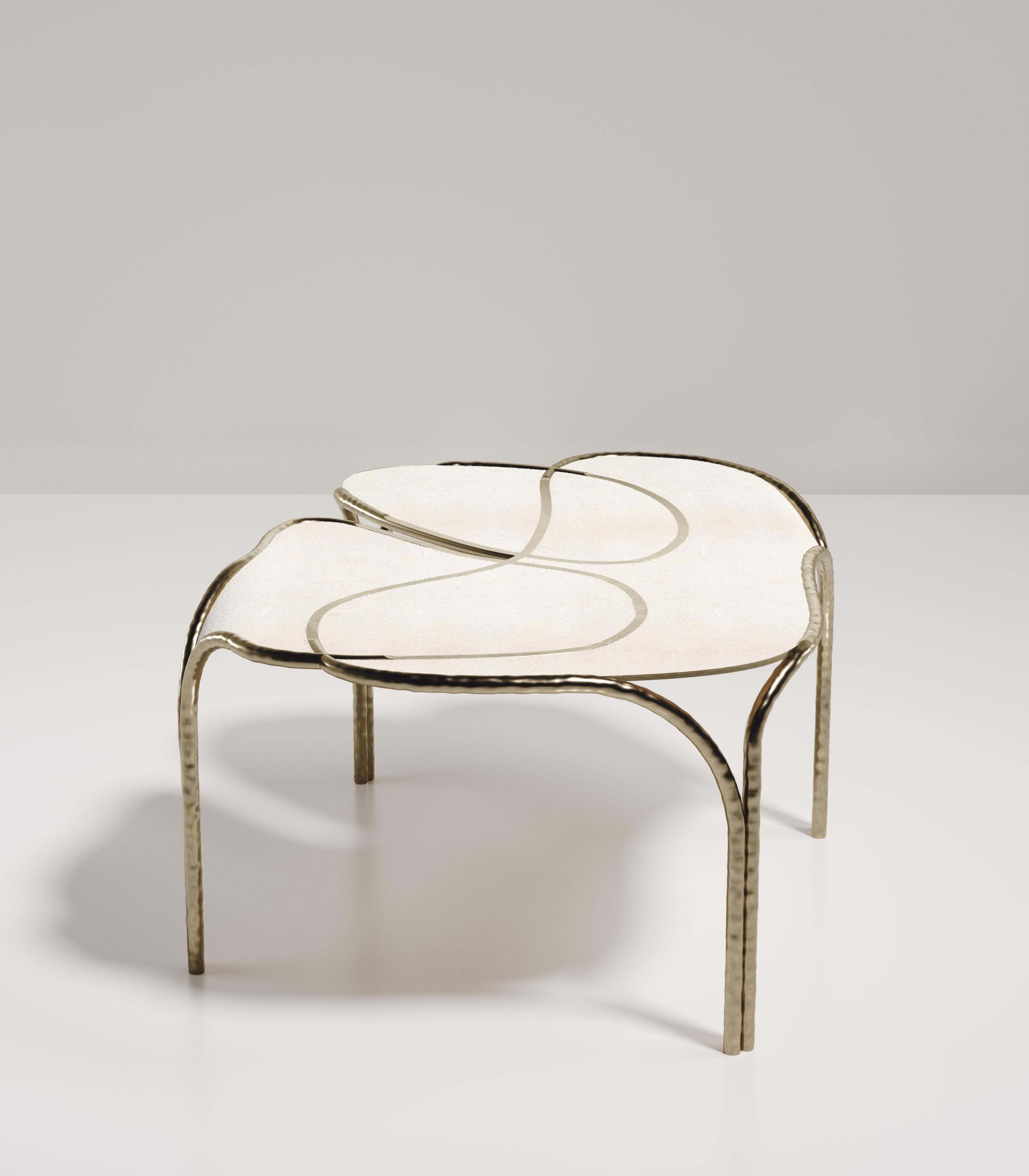 https://a.1stdibscdn.com/shagreen-coffee-table-with-bronze-patina-brass-details-by-ry-augousti-for-sale-picture-5/f_45491/f_267965321641496417529/ARIANE_LOW_TABLE_D1_B0001_master.jpg