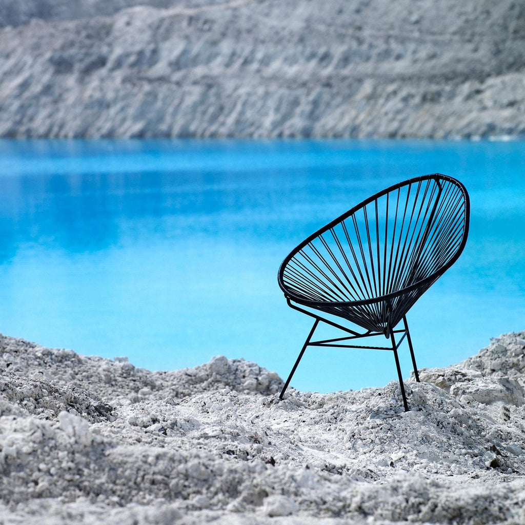 https://a.1stdibscdn.com/black-acapulco-chair-by-ok-design-for-sale-picture-5/f_12192/f_414526421726176747090/Acapulco_chair_Black_Action_4_master.jpg