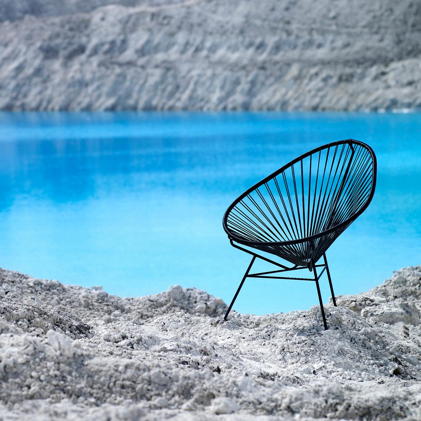 https://a.1stdibscdn.com/black-acapulco-chair-by-ok-design-for-sale-picture-5/f_12192/f_414526421726176747090/Acapulco_chair_Black_Action_4_master.jpg
