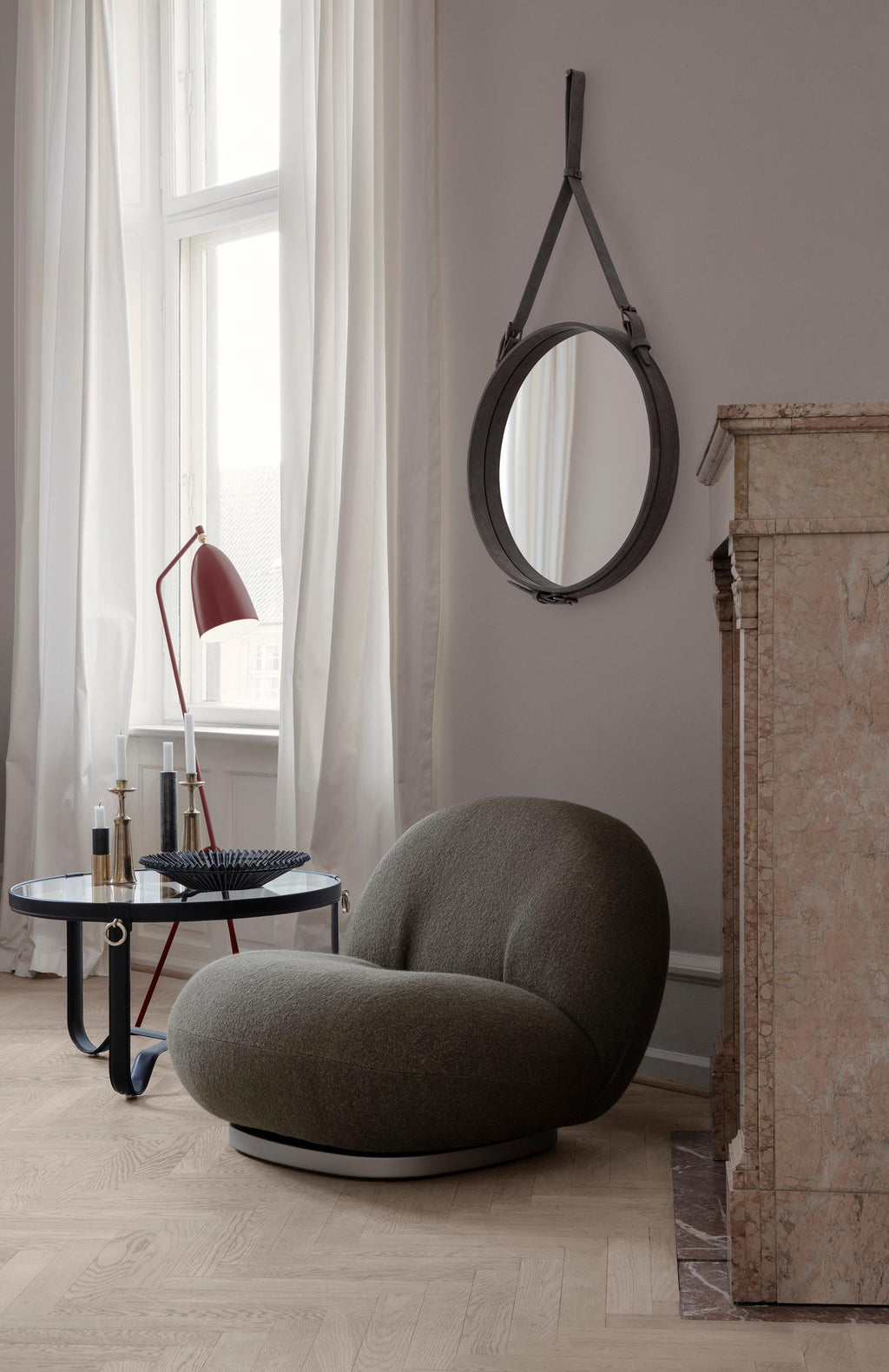 https://a.1stdibscdn.com/large-jacques-adnet-circulaire-glass-and-black-leather-coffee-table-for-gubi-for-sale-picture-2/f_14472/f_365626021697036990418/AdnetCoffeeTableCircular_GrasshoppaFloorLamp_AdnetWallMirrorAlcantara_PachaLoungeChair_on_1_master.jpg