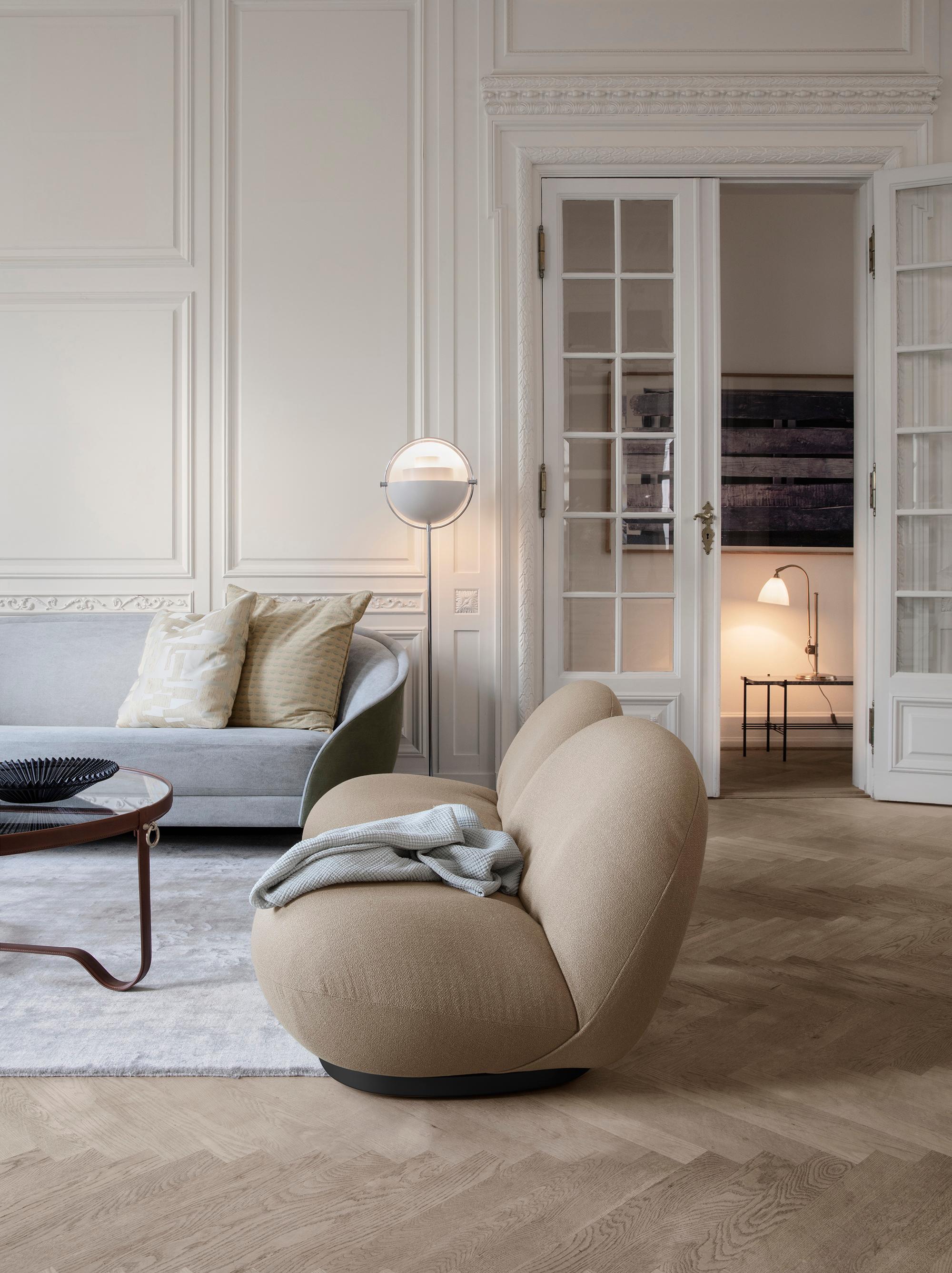 https://a.1stdibscdn.com/large-jacques-adnet-circulaire-glass-and-black-leather-coffee-table-for-gubi-for-sale-picture-8/f_14472/f_365626021697037003048/AdnetCoffeeTableCircular_MategotBowl_PachaLoungeChair_ReversSofa_Multi_LiteLamp_TSConsole_BL1TableLamp_on_master.jpg