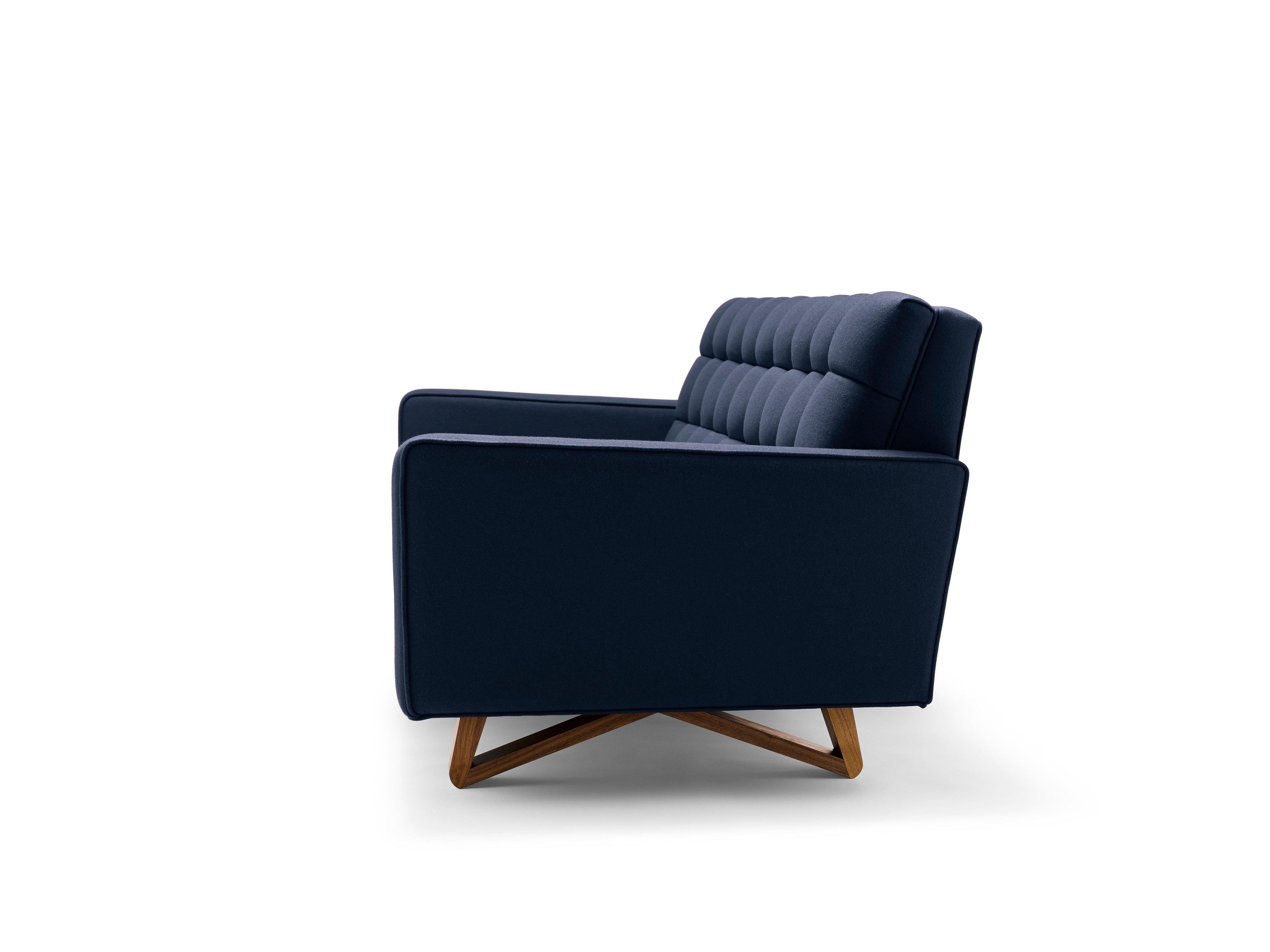 https://a.1stdibscdn.com/contemporary-adoni-sofa-in-dark-blue-wool-with-walnut-legs-for-sale-picture-6/f_27813/f_461369221764259843173/Adoni_Blue_2_master.jpg