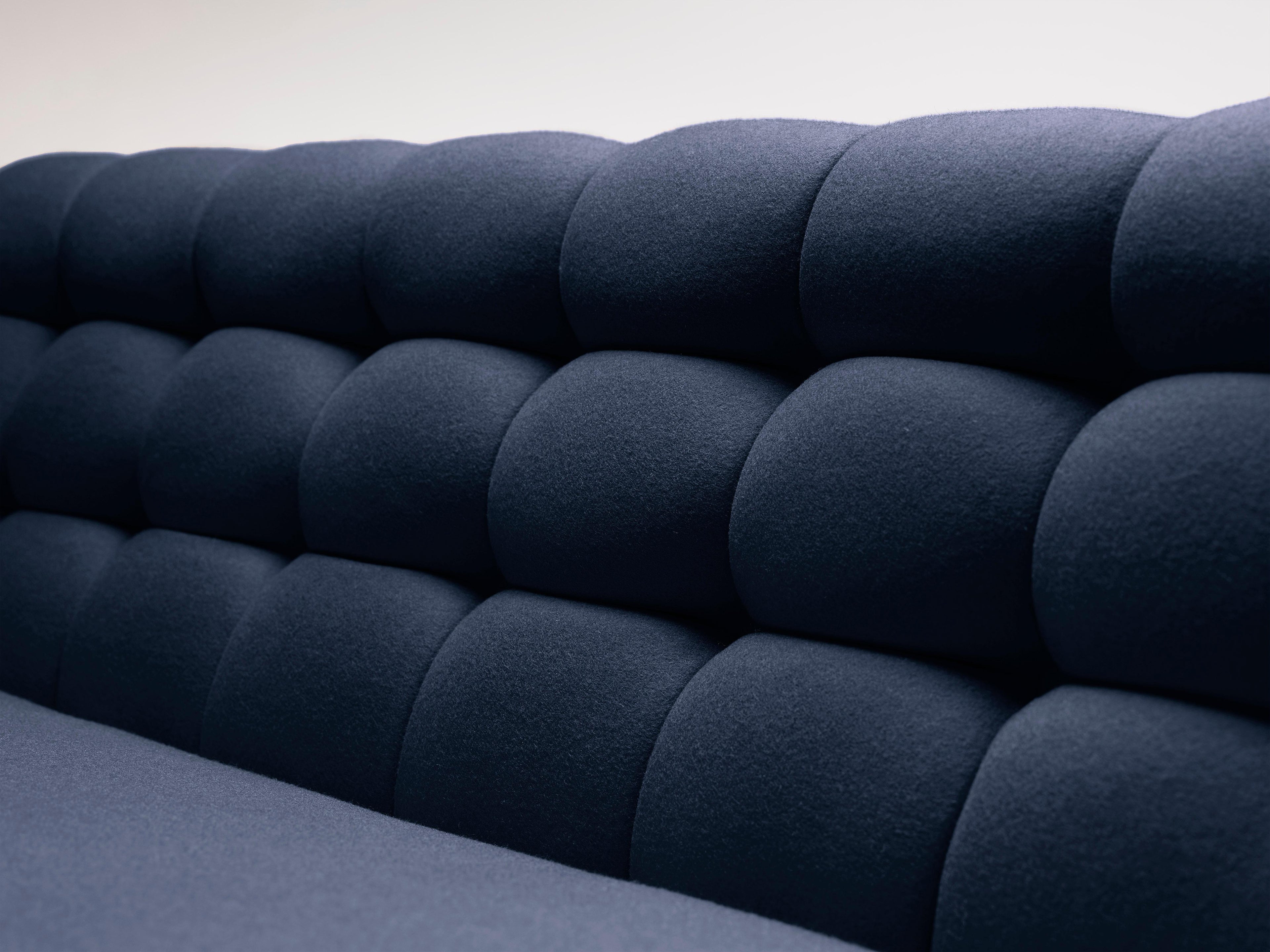 https://a.1stdibscdn.com/contemporary-adoni-sofa-in-dark-blue-wool-with-walnut-legs-for-sale-picture-5/f_27813/f_461369221764259845201/Adoni_blue_3_master.jpg