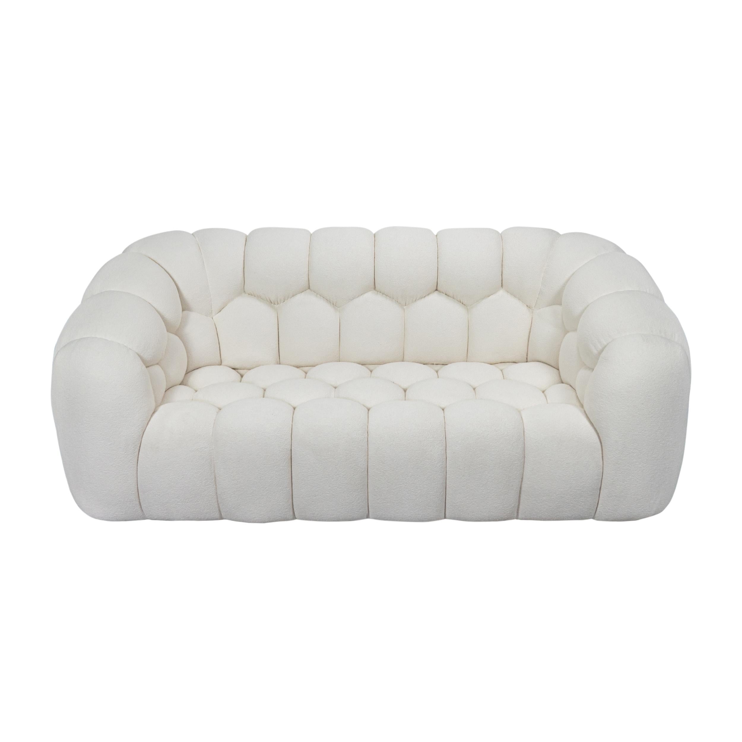 https://a.1stdibscdn.com/curved-boucle-bubble-style-sofa-with-paneled-upholstery-for-sale-picture-2/f_21233/f_484344221769018083465/Aerie_Sofa_0003_Front_E2_master.jpg