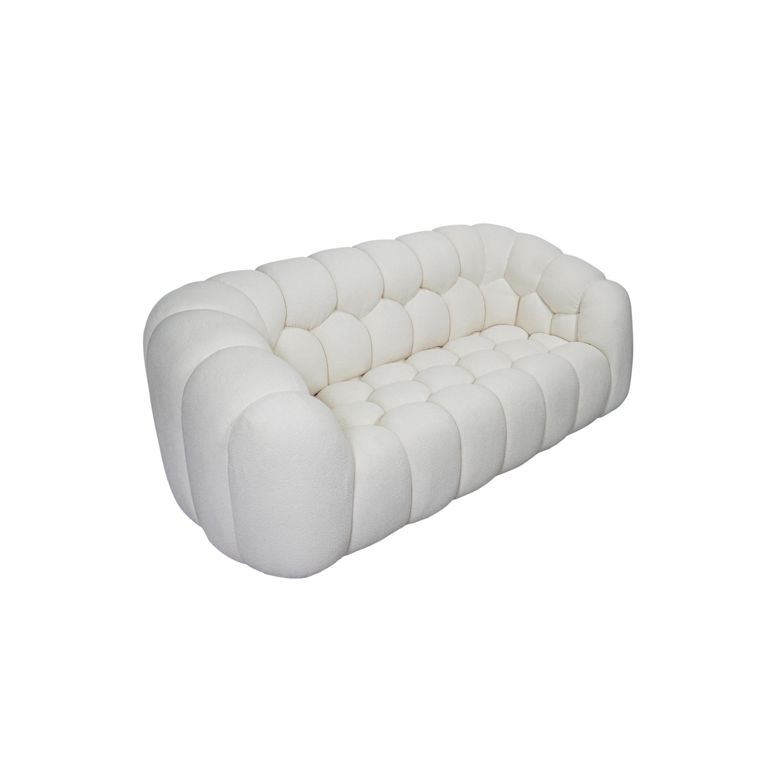 https://a.1stdibscdn.com/curved-boucle-bubble-style-sofa-with-paneled-upholstery-for-sale-picture-4/f_21233/f_484344221769018084382/Aerie_Sofa_0006_Angle_E2_master.jpg