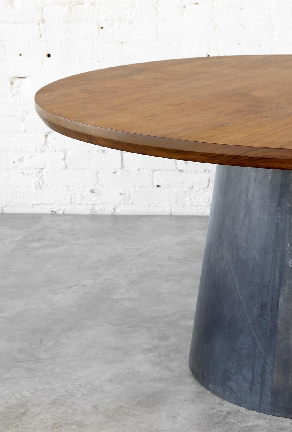 https://a.1stdibscdn.com/round-black-walnut-dining-table-sculptural-steel-base-custom-sizes-for-sale-picture-7/f_77532/f_468642921776262981617/Alexandra_Table_2_Autonomous_Furniture_master.jpg