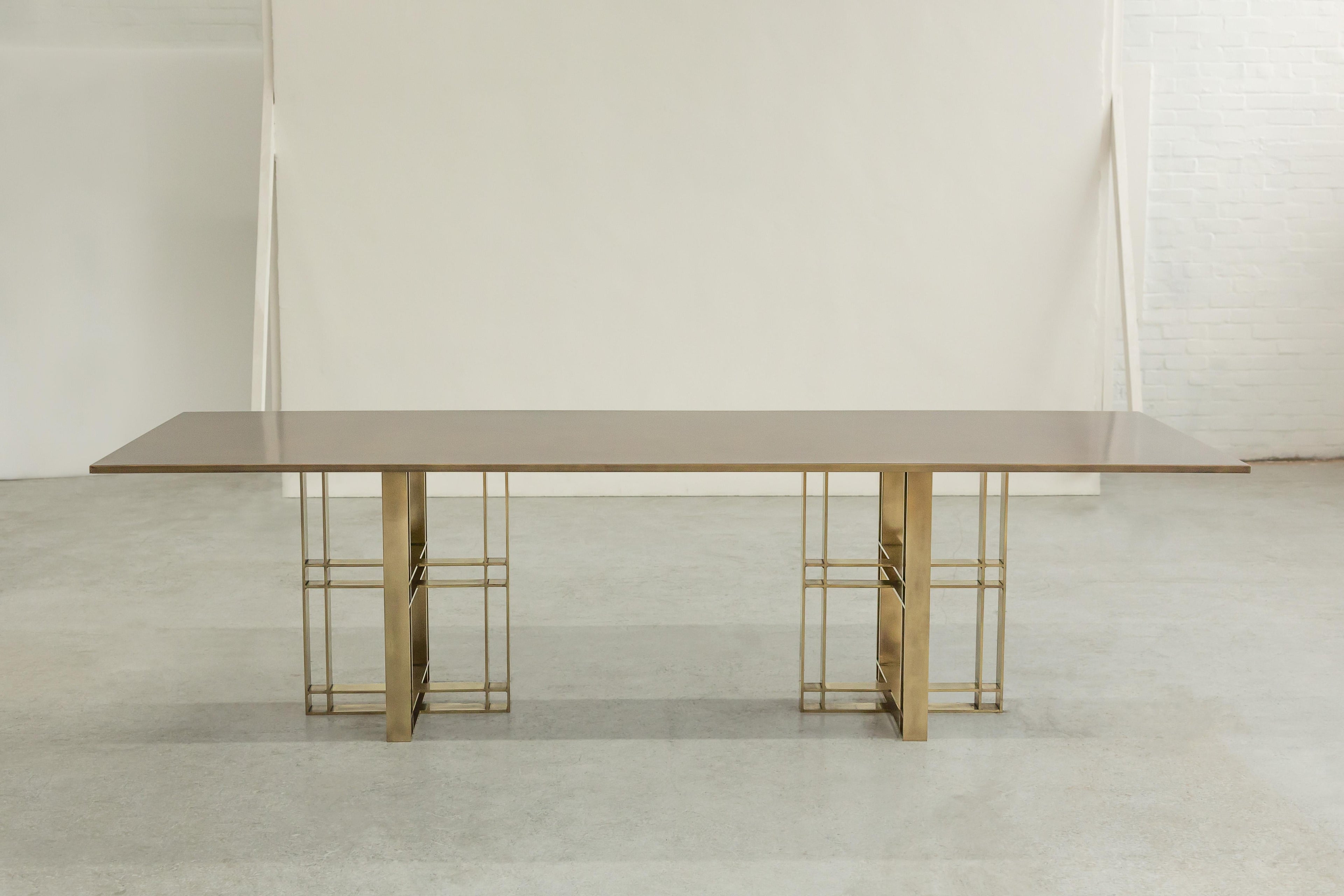 https://a.1stdibscdn.com/athwart-dining-table-all-patinated-brass-made-in-britain-for-sale-picture-2/f_25883/f_274701921679922830315/All_Brass_Athwart_5_master.jpg