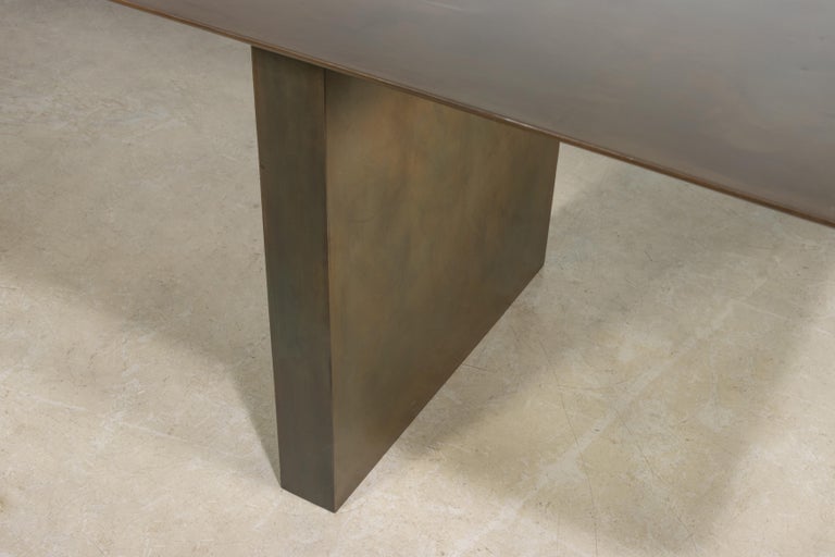 https://a.1stdibscdn.com/sculptural-twin-pedestal-patinated-steel-dining-table-andre-fierro-x-costantini-for-sale-picture-10/f_25173/f_482514521767973130926/Andre_Fierro_Table_Gun_Metal_Patinated_Steel_Twin_Pedestal_Dining_Table_by_Costantini_08_master.jpg?width=768