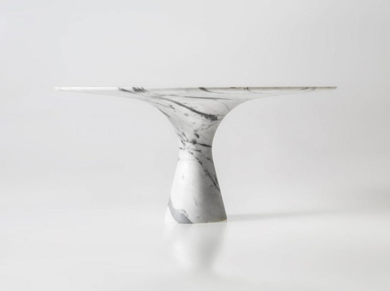 https://a.1stdibscdn.com/travertino-silver-refined-contemporary-marble-dining-table-180-75-for-sale-picture-7/f_12192/f_319945621672425737115/Angelo_M_Bianco_Statuarietto_1_1348x1005_master.jpg?width=768