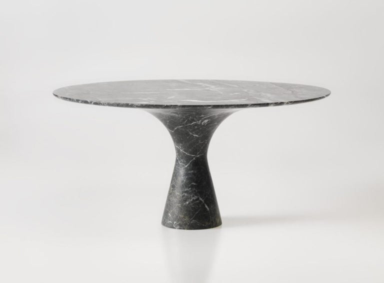 https://a.1stdibscdn.com/travertino-silver-refined-contemporary-marble-dining-table-180-75-for-sale-picture-4/f_12192/f_319945621672425735355/Angelo_M_Grey_Saint_Laurent_3_1348x993_master.jpg?width=768