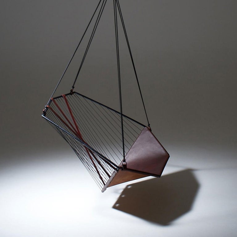 https://a.1stdibscdn.com/genuine-leather-modern-angular-suspended-sling-chair-for-sale-picture-12/f_32773/f_304216121663153547711/Angular_Sling_12_master.jpg?width=768
