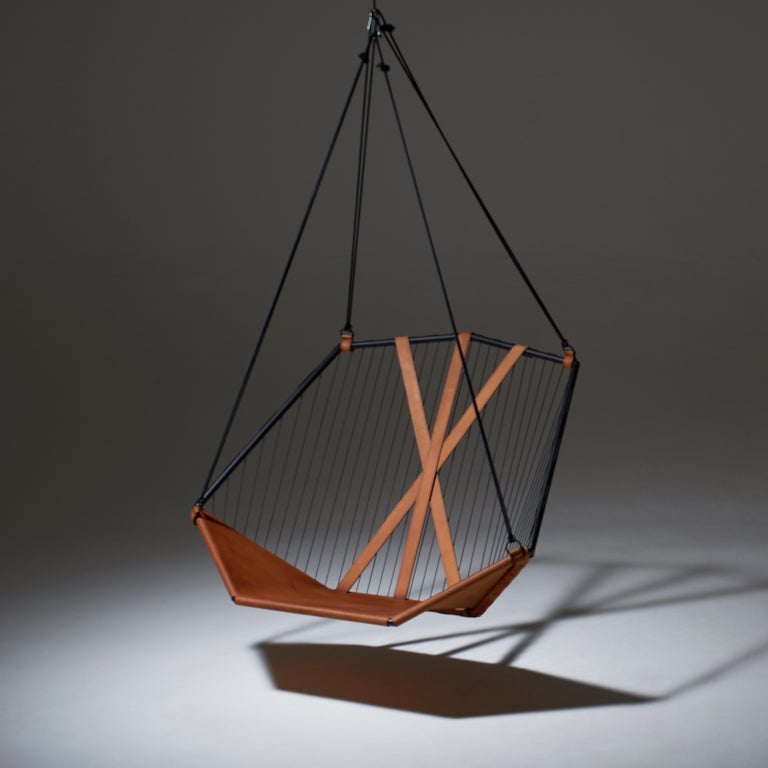 https://a.1stdibscdn.com/genuine-leather-modern-angular-suspended-sling-chair-for-sale-picture-2/f_32773/f_304216121663153546440/Angular_Sling_1_master.jpg?width=768