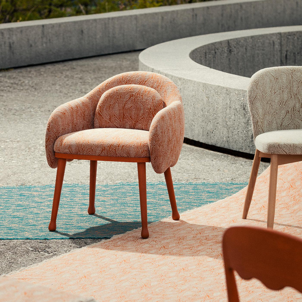 https://a.1stdibscdn.com/corolla-279-orange-armchair-by-cristina-celestino-for-sale-picture-4/f_17062/f_262566721637749387665/AnyConv_com_elolzjib5fz35xy2gbdwpdc6j48h_master.jpg