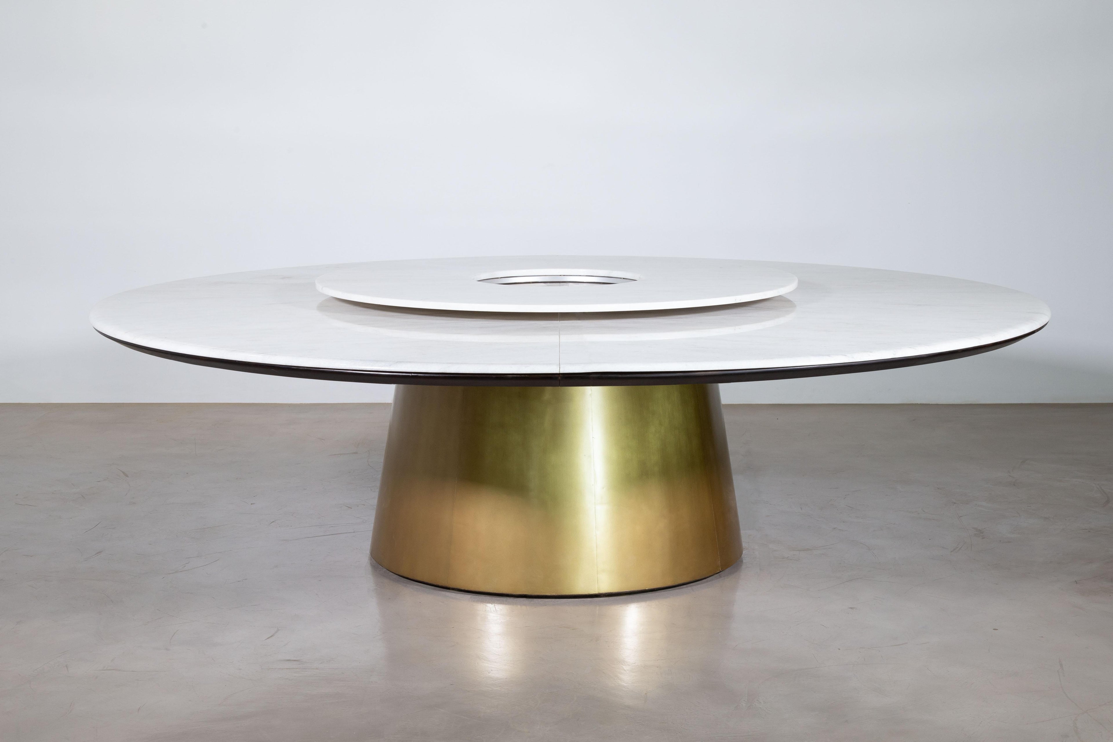 https://a.1stdibscdn.com/stone-bronze-dining-table-with-rotating-server-by-costantini-aragon-for-sale-picture-2/f_25173/f_272391221741189150914/Aragon_Bronze_and_Marble_Dining_Table_with_Rotating_Server_by_Costantini_00_master.jpg
