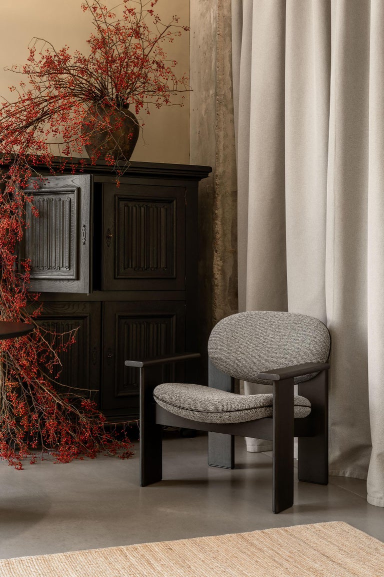 https://a.1stdibscdn.com/patterned-accent-lounge-chair-with-armrests-tiger-beat-jacquard-archipen-noom-for-sale-picture-4/f_42321/f_480587221773407200755/Archipen_Lounge_Chair_by_NOOM_web_47__master.jpg?width=768