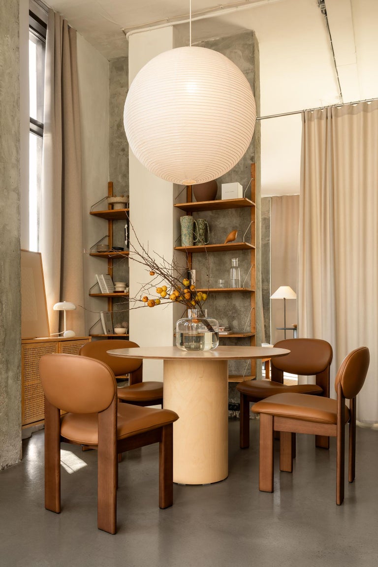 https://a.1stdibscdn.com/sculptural-wooden-dining-chair-archipen-by-noom-genuine-leather-ash-tan-color-for-sale-picture-3/f_42321/f_420094721778160955462/Archipen_chair_by_NOOM_in_interior_1__master.jpg?width=768