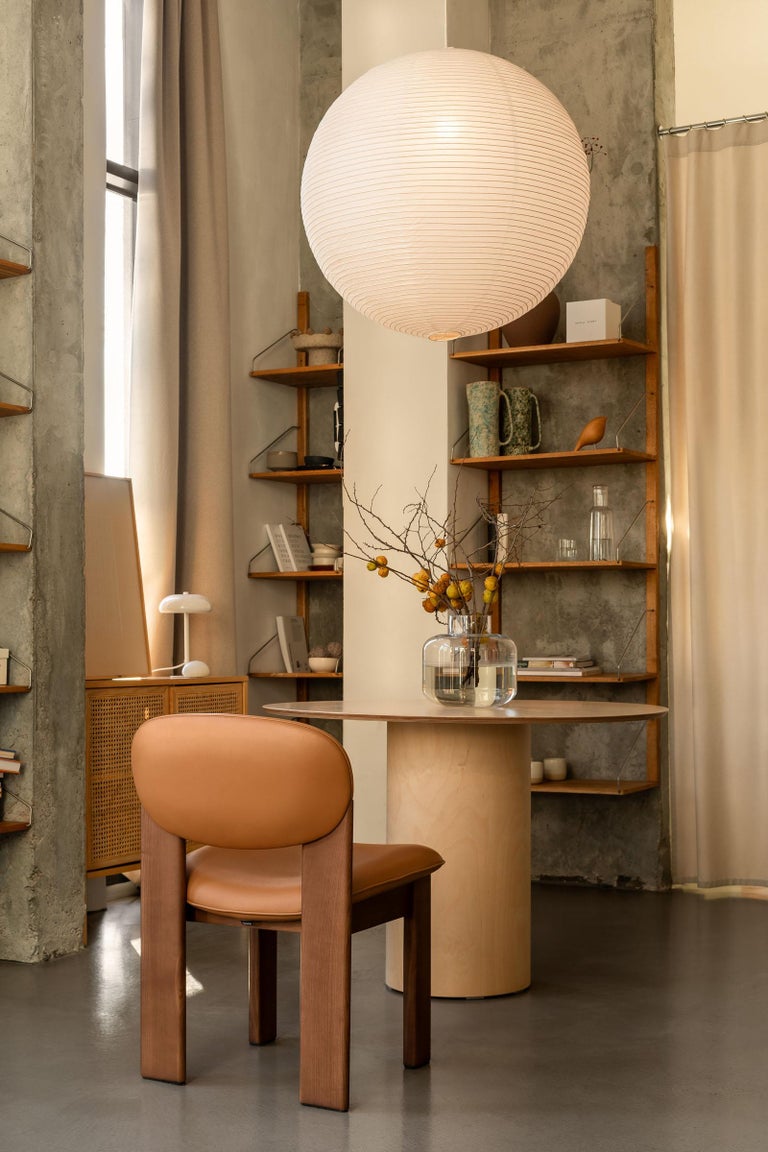 https://a.1stdibscdn.com/sculptural-wooden-dining-chair-archipen-by-noom-genuine-leather-ash-tan-color-for-sale-picture-17/f_42321/f_420094721778160955457/Archipen_chair_by_NOOM_in_interior_6__master.jpg?width=768