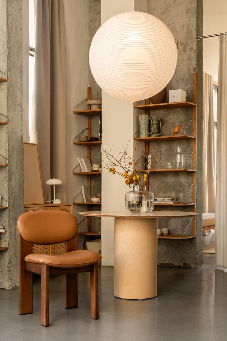 https://a.1stdibscdn.com/sculptural-wooden-dining-chair-archipen-by-noom-genuine-leather-ash-tan-color-for-sale-picture-18/f_42321/f_420094721778160955490/Archipen_chair_by_NOOM_in_interior_7__master.jpg?width=768
