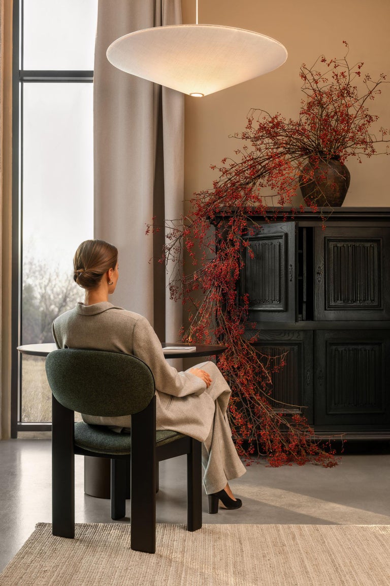 https://a.1stdibscdn.com/sculpted-dining-chair-in-forest-green-kvadrat-wool-archipen-by-noom-for-sale-picture-8/f_42321/f_420096021778160544900/Archipen_chair_by_NOOM_in_interior_8__master.jpg?width=768