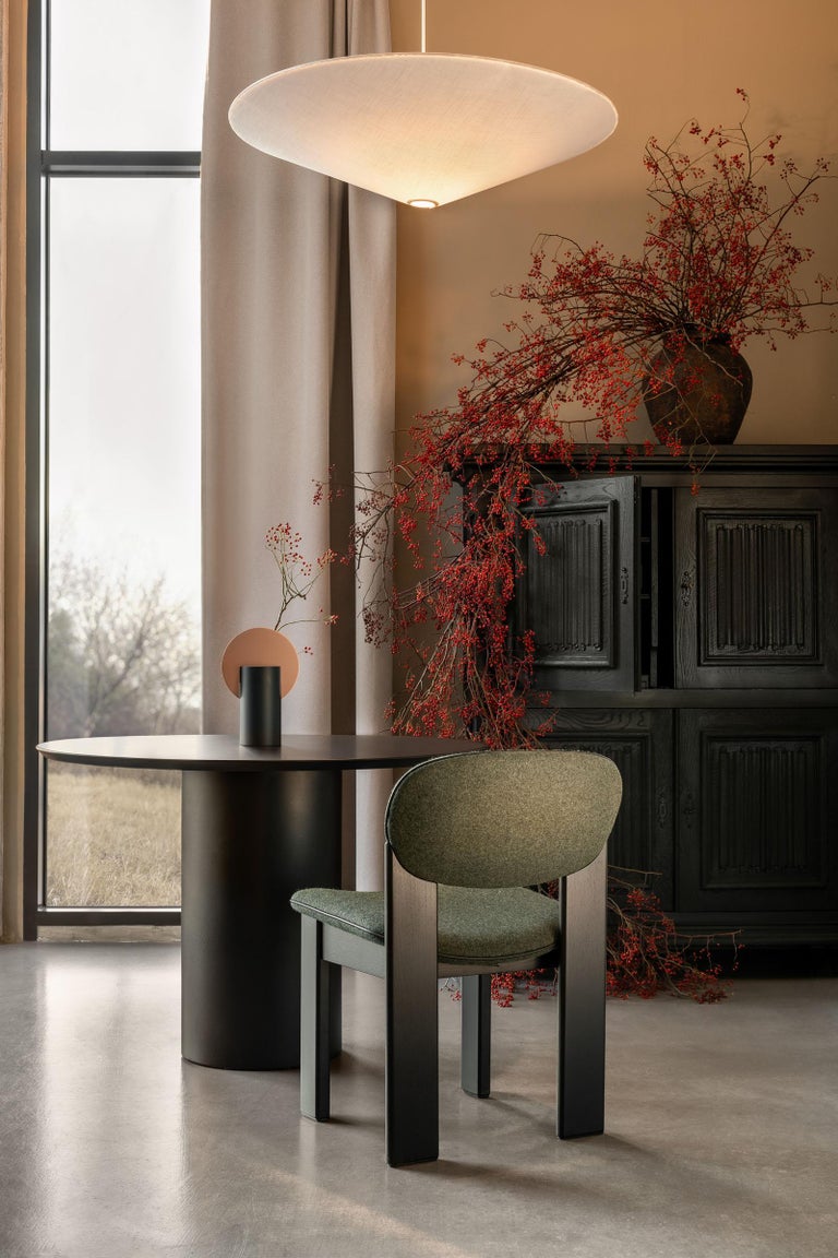 https://a.1stdibscdn.com/sculpted-dining-chair-in-forest-green-kvadrat-wool-archipen-by-noom-for-sale-picture-3/f_42321/f_420096021778160544715/Archipen_chair_by_NOOM_in_interior_9__master.jpg?width=768