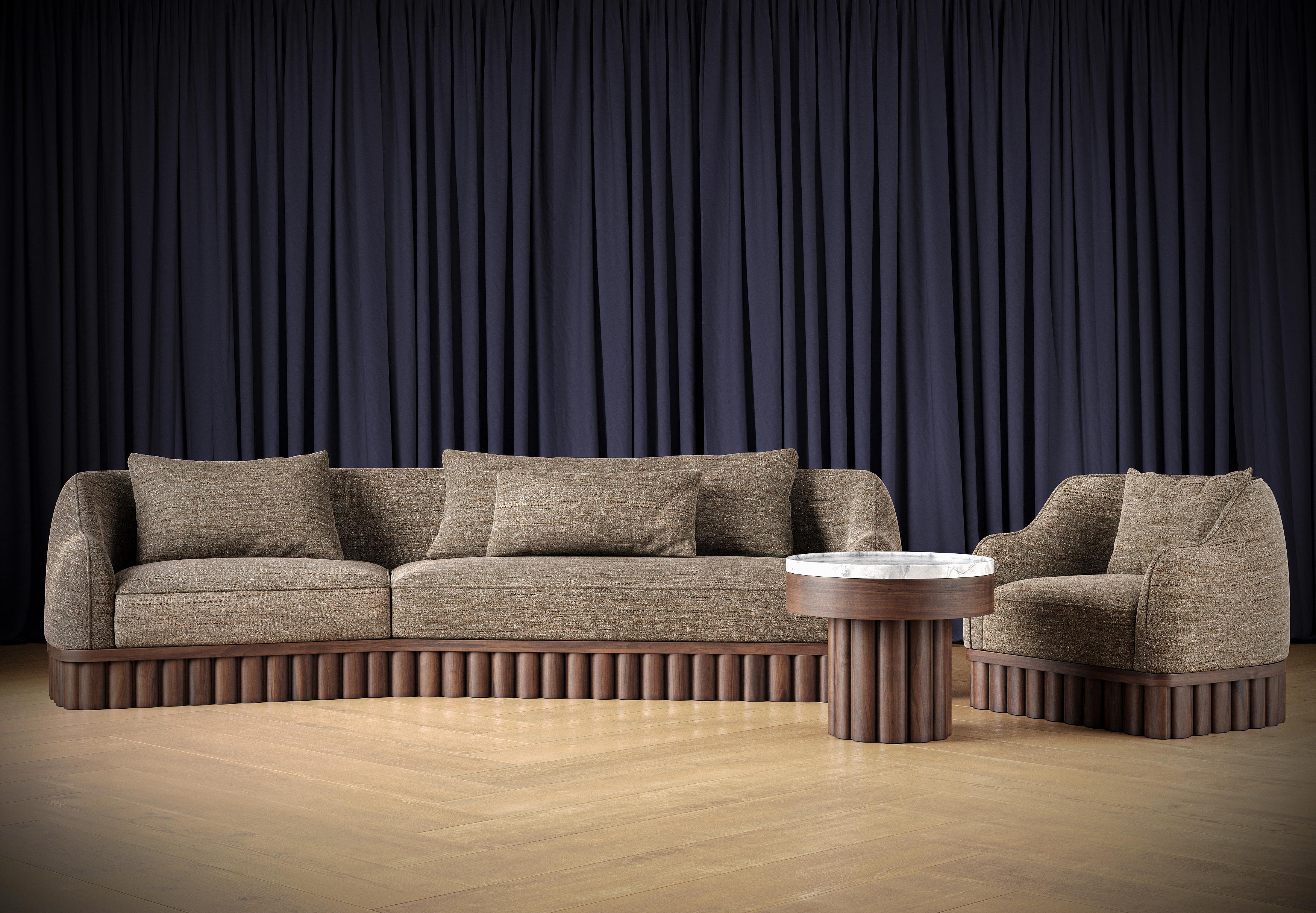 https://a.1stdibscdn.com/ripple-sofa-angular-curved-silhouette-with-sculptural-carved-wood-base-for-sale-picture-6/f_27693/f_468177521758869522886/Armchair_Sidetable_Sofa_Render01_master.jpg
