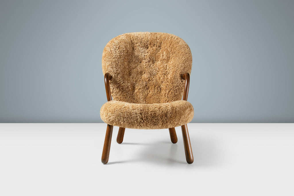 https://a.1stdibscdn.com/arnold-madsen-sheepskin-clam-chair-stool-for-sale-picture-7/f_13332/f_425325221732923745353/ArnoldMadsen_ClamChair_SK_Maple_Fumed_Oak_Front_Stage_master.jpg