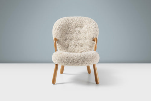 https://a.1stdibscdn.com/arnold-madsen-sheepskin-clam-chair-new-edition-for-sale-picture-2/f_13332/f_406689721721213726933/ArnoldMadsen_Clam_Chair_SK_Moonlight_Oiled_Oak_Front_Stage_master.jpg