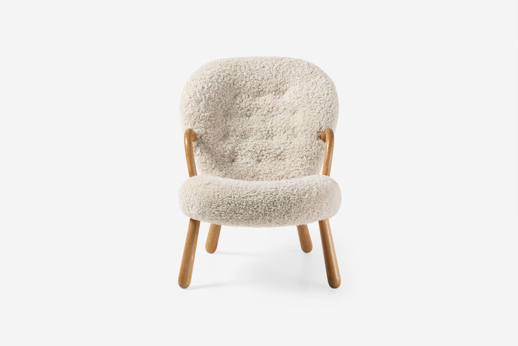 https://a.1stdibscdn.com/arnold-madsen-sheepskin-clam-chair-stool-for-sale-picture-6/f_13332/f_425325721732925299684/ArnoldMadsen_Clam_Chair_SK_Moonlight_Oiled_Oak_Front_Wide_master.jpg