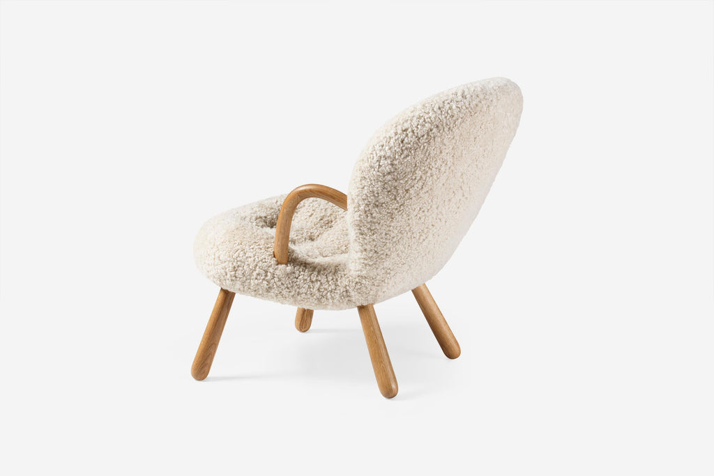 https://a.1stdibscdn.com/arnold-madsen-sheepskin-clam-chair-stool-for-sale-picture-13/f_13332/f_425325721732925299648/ArnoldMadsen_Clam_Chair_SK_Moonlight_Oiled_Oak_Rear_Wide_master.jpg
