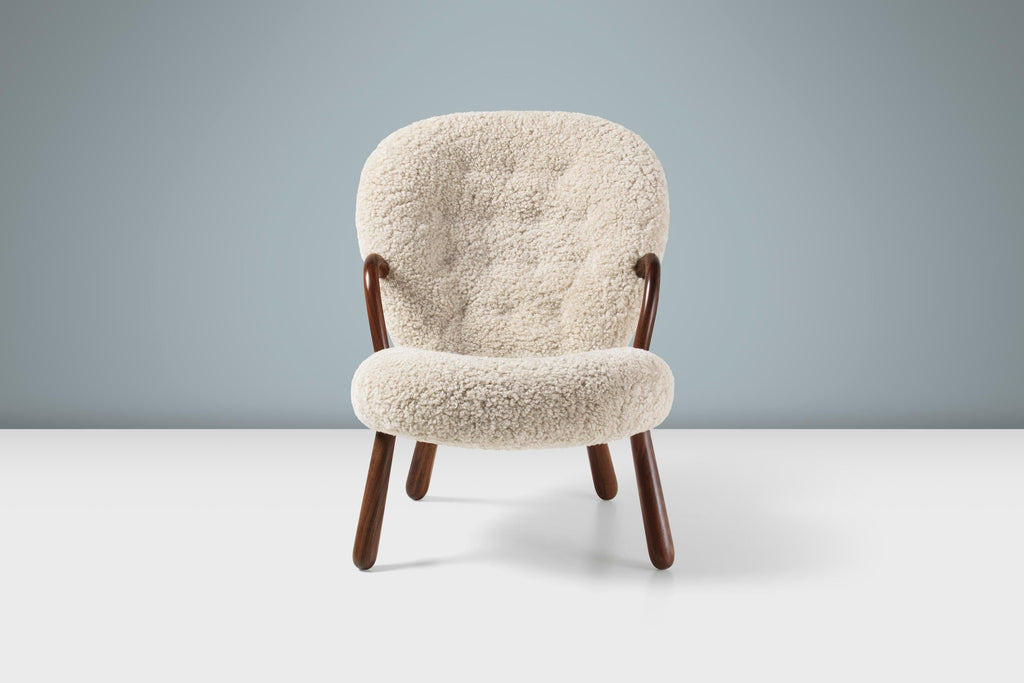 https://a.1stdibscdn.com/arnold-madsen-sheepskin-clam-chair-stool-for-sale-picture-2/f_13332/f_413826121725795213206/ArnoldMadsen_Clam_Chair_SK_Moonlight_Walnut_Front_Stage_master.jpg