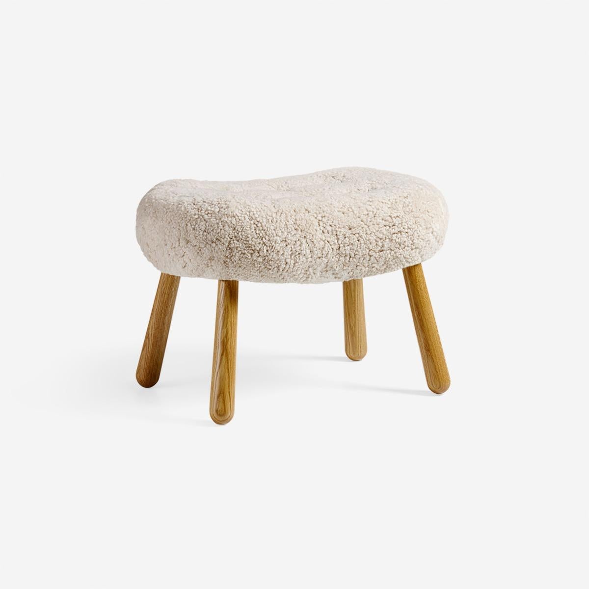 https://a.1stdibscdn.com/arnold-madsen-sheepskin-clam-stool-for-sale-picture-2/f_13332/f_427735021734355219093/ArnoldMadsen_Clam_Stool_SK_Moonlight_Oiled_Oak_Angle_master.jpg
