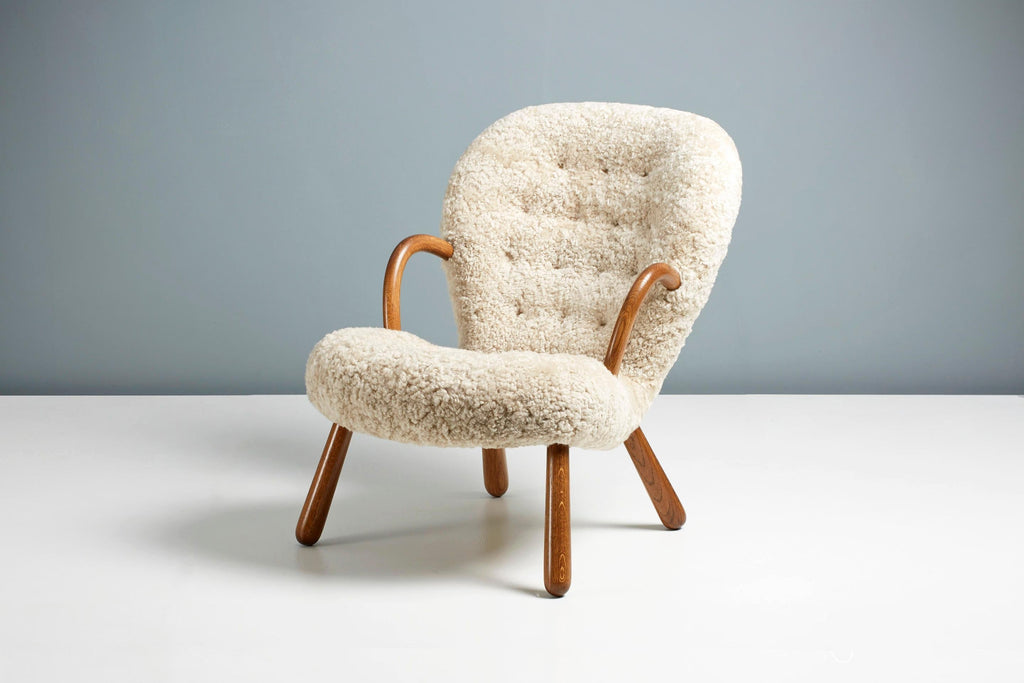 https://a.1stdibscdn.com/arnold-madsen-sheepskin-clam-chair-1944-for-sale-picture-4/f_67442/f_286035721652207644457/ArnoldMadsen_Dagmar_ClamChairREPRO_MoonlightOiledOak_08_copy_master.jpg
