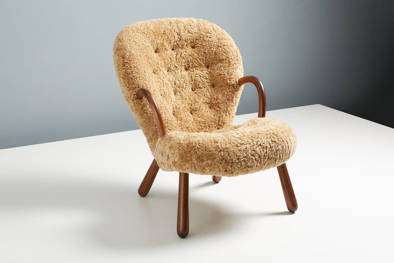 https://a.1stdibscdn.com/pair-of-arnold-madsen-sheepskin-clam-chairs-1944-for-sale-picture-3/f_67442/f_288879921653951898686/ArnoldMadsen_Dagmar_ClamChair_REPRO_Maple_OiledOak_28_master.jpg?width=768
