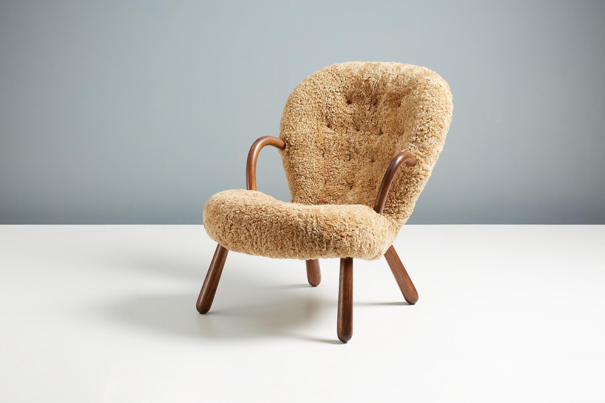 https://a.1stdibscdn.com/arnold-madsen-sheepskin-clam-chair-1944-for-sale-picture-4/f_67442/f_285918121653923642214/ArnoldMadsen_Dagmar_ClamChair_REPRO_Maple_OiledOak_30_master.jpg