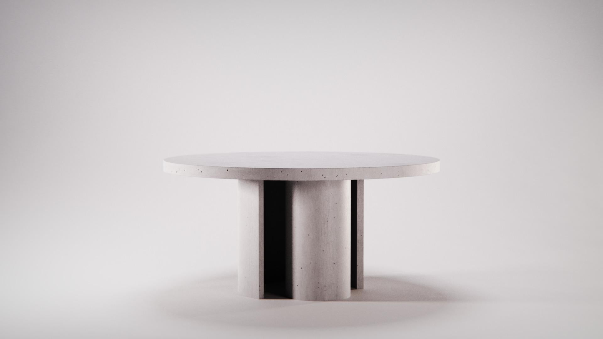 https://a.1stdibscdn.com/concrete-circular-dining-table-atlante-ultra-high-perfomance-cement-mortar-for-sale-picture-7/f_38941/f_438743321741011479539/Atlante_Dining_Table_designed_by_Gabriele_De_Chirico_150x73_Silver_master.jpg