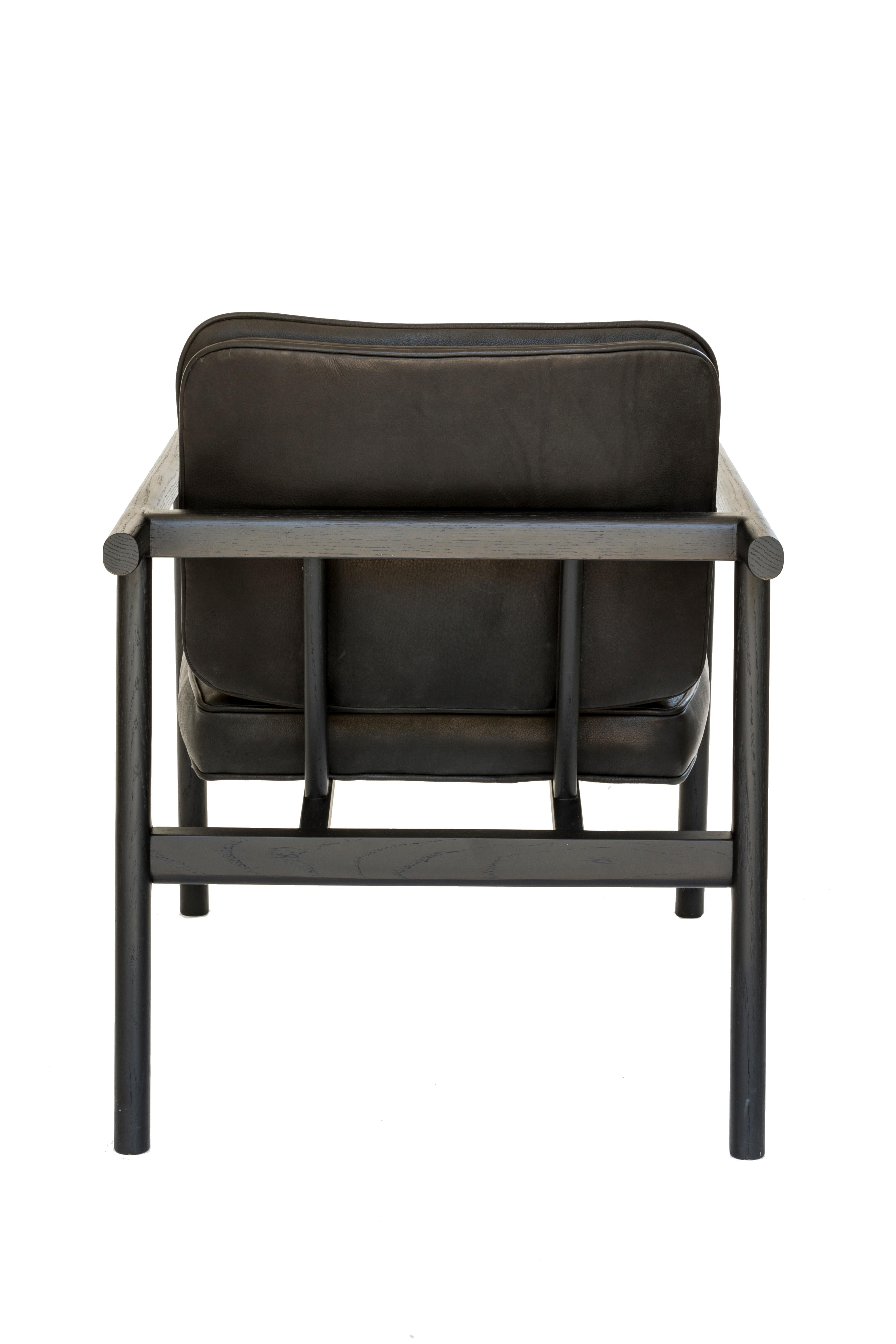 https://a.1stdibscdn.com/chris-earl-ebonized-oak-black-leather-moresby-armchair-for-sale-picture-4/f_24193/1537907749714/_B9B9988_Edit_master.jpg