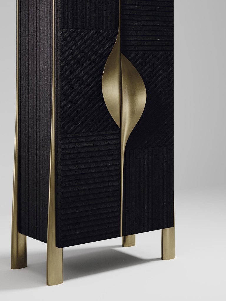 https://a.1stdibscdn.com/shagreen-bar-cabinet-with-bronze-patina-brass-details-by-ry-augousti-for-sale-picture-3/f_45491/f_294306621656997333556/BAR_D156_4A_master.jpg?width=768