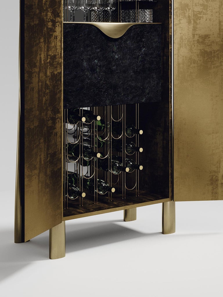 https://a.1stdibscdn.com/shagreen-bar-cabinet-with-bronze-patina-brass-details-by-ry-augousti-for-sale-picture-7/f_45491/f_294306621656997335826/BAR_D156_4B_master.jpg?width=768