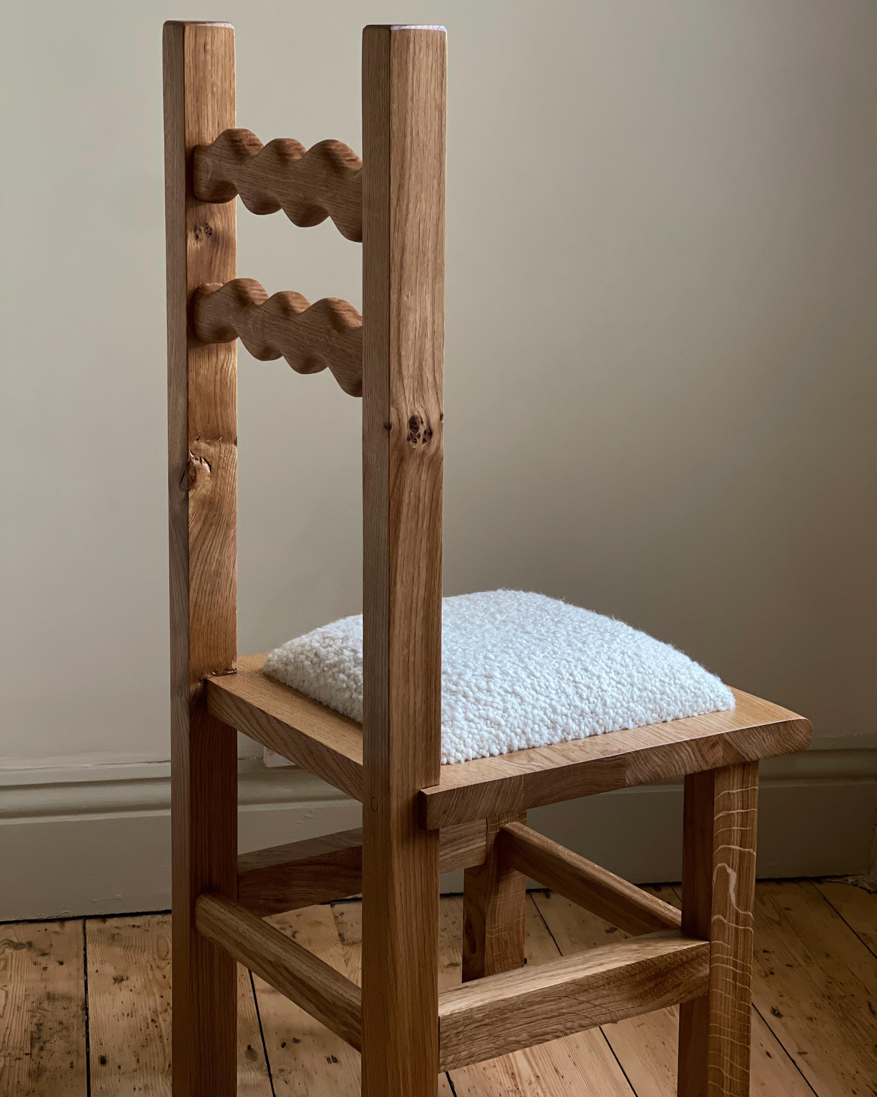https://a.1stdibscdn.com/sunday-chair-oak-and-boucle-for-sale-picture-4/f_85912/f_339068921682013484595/BB968B8E_C7D6_4AF4_9A61_592868B04EA3_master.jpeg