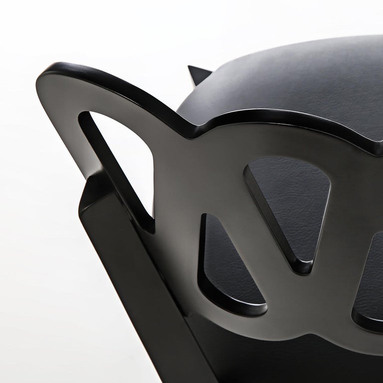 https://a.1stdibscdn.com/ponti-969-black-leather-chair-by-go-ponti-for-sale-picture-3/f_17062/f_275147721645708906214/BBBIVI_031_B20180723_7509_1gwfij4_master.jpg?width=768