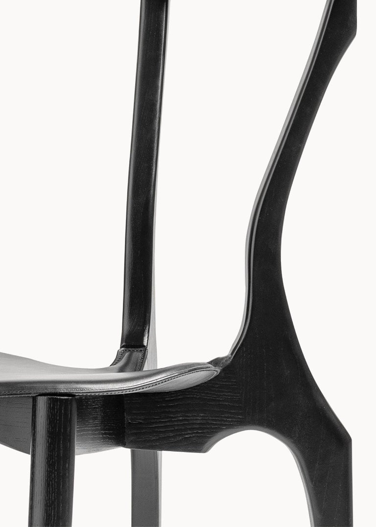 https://a.1stdibscdn.com/spanish-dining-chair-gaulinetta-by-oscar-tusquets-ash-wood-gaulino-collection-for-sale-picture-14/f_30483/f_291368921697455910755/BDBarcelona_Gaulinetta_OscarTusquets_Black2_master.jpg?width=768