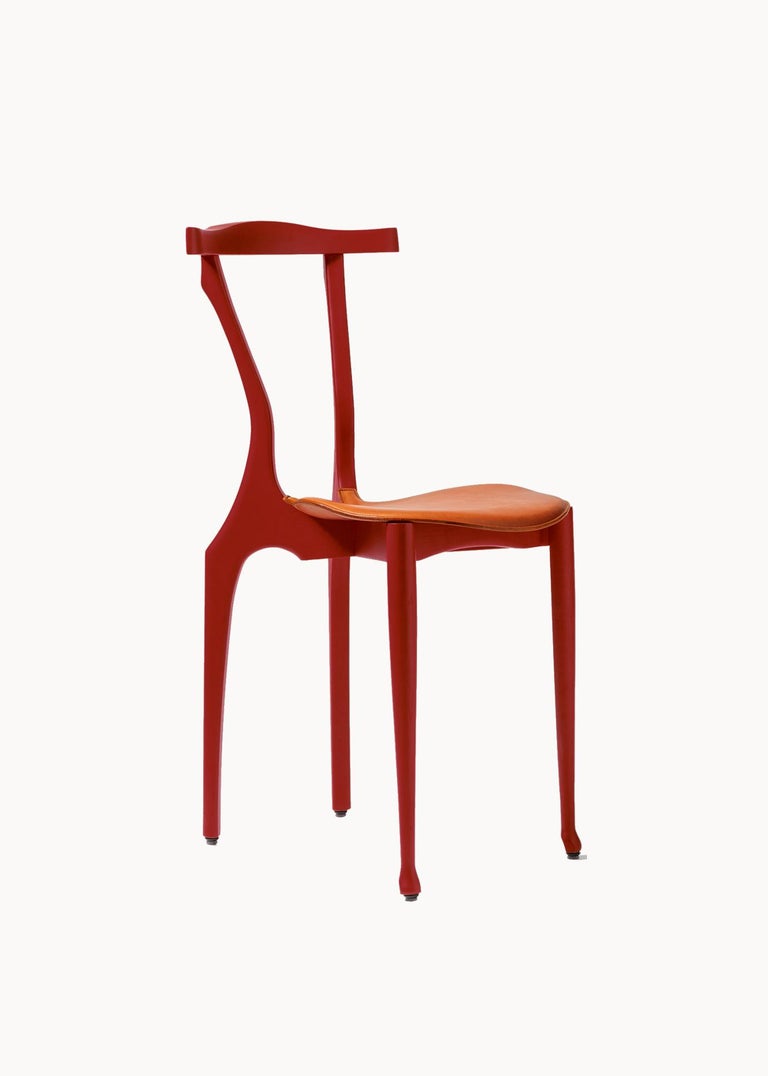https://a.1stdibscdn.com/spanish-dining-chair-gaulinetta-by-oscar-tusquets-ash-wood-gaulino-collection-for-sale-picture-15/f_30483/f_291368921697455910371/BDBarcelona_Gaulinetta_OscarTusquets_Red_master.jpg?width=768