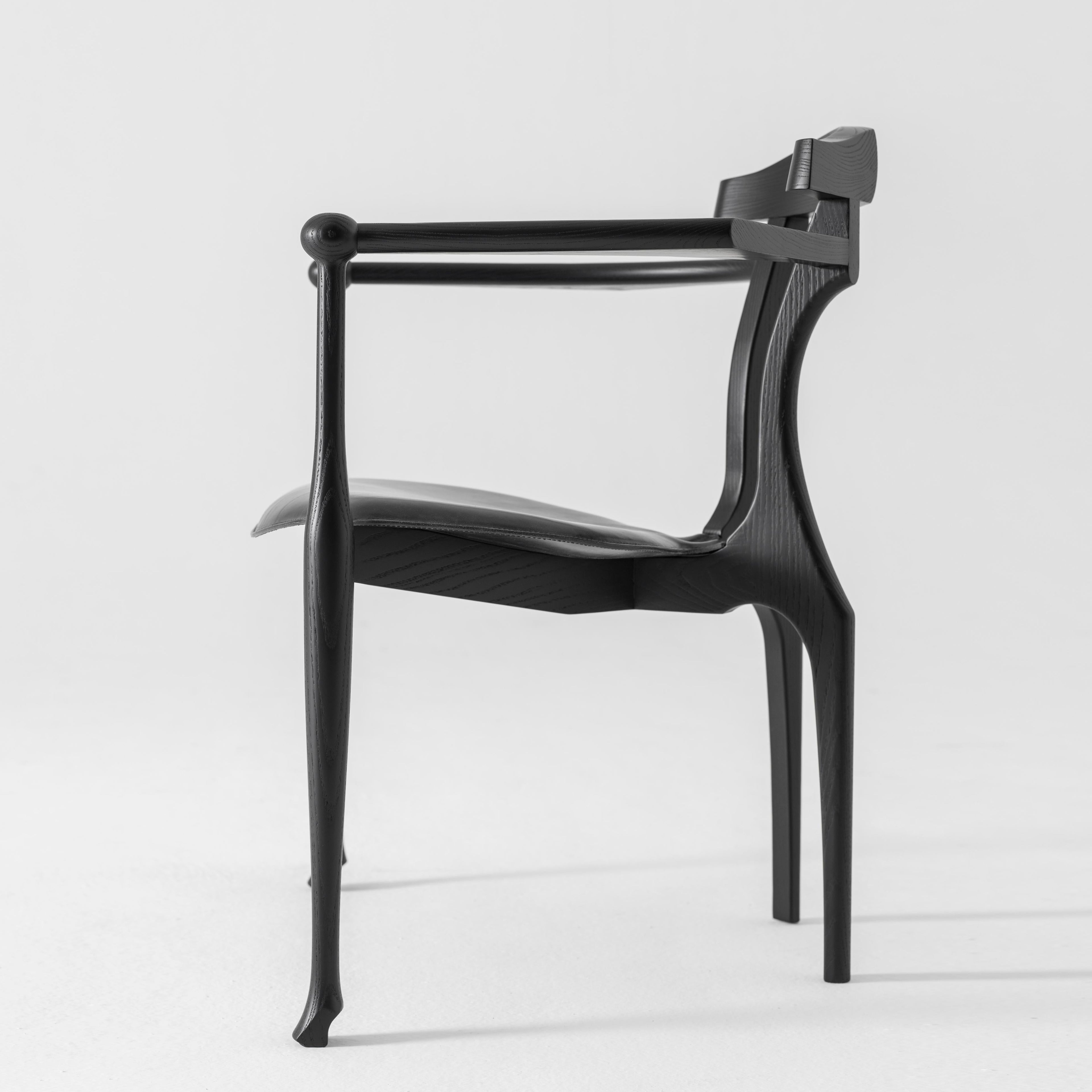 https://a.1stdibscdn.com/oscar-tusquets-mid-century-modern-black-ash-gaulino-spanish-easy-chairs-for-sale-picture-2/f_14272/f_333037921678878428344/BD_Gaulino_easy_chair_Oscar_Tusquets_1_master.jpg