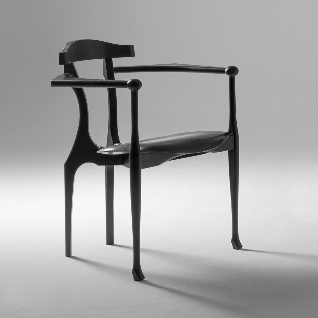 https://a.1stdibscdn.com/oscar-tusquets-mid-century-modern-black-ash-gaulino-spanish-easy-chairs-for-sale-picture-3/f_14272/f_333037921678878428896/BD_Gaulino_easy_chair_Oscar_Tusquets_5_master.jpg
