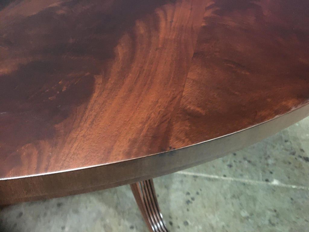 https://a.1stdibscdn.com/60-in-round-mahogany-georgian-style-pedestal-dining-table-by-leighton-hall-for-sale-picture-15/f_44162/f_227264821614449754275/BFA2E082_54C3_445B_9843_2445E11B4A46_master.jpeg