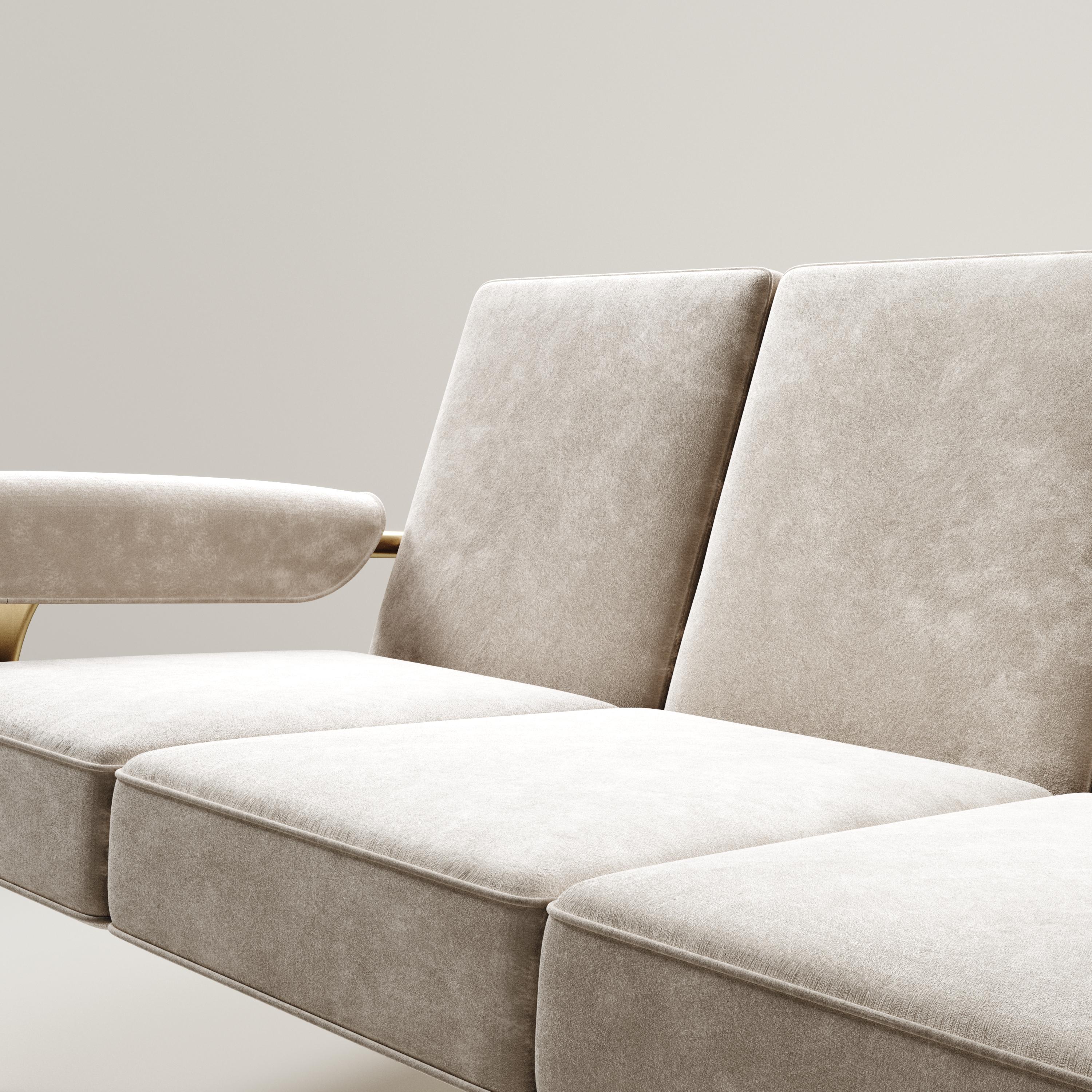 https://a.1stdibscdn.com/upholstered-sofa-with-brass-details-by-ry-augousti-for-sale-picture-2/f_45491/f_354985821690873204282/BRG_VL0_1__master.jpg